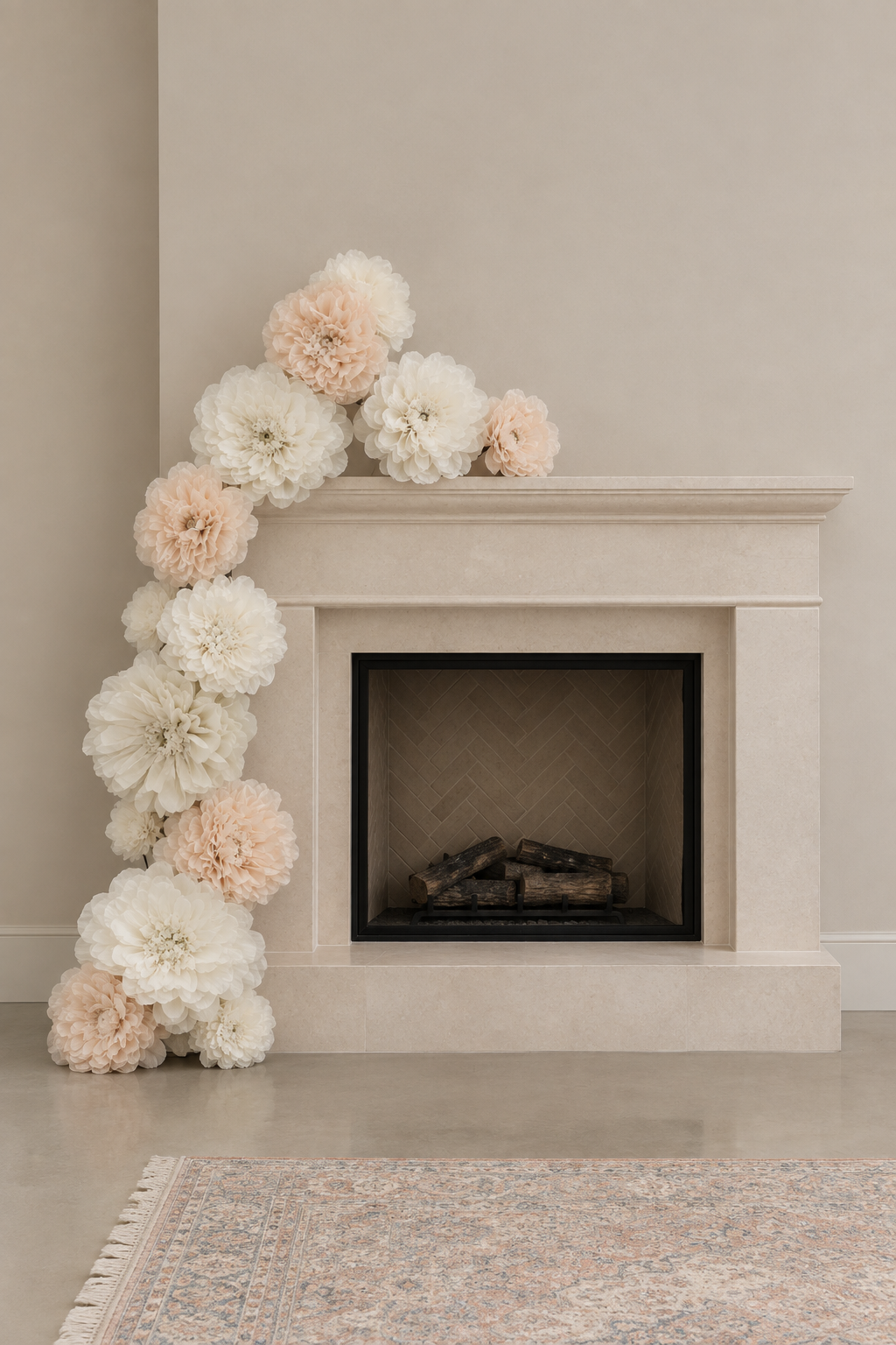 Ivory, cream and taupe jumbo paper flowers cascading over a fireplace mantel